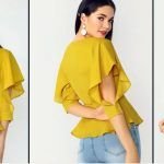 Blusa cruzada con manga godet con puños
