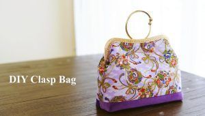 Bolso de mano cierre metálico
